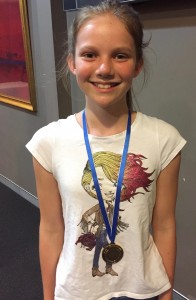 photo of Zoe Peck with her medal